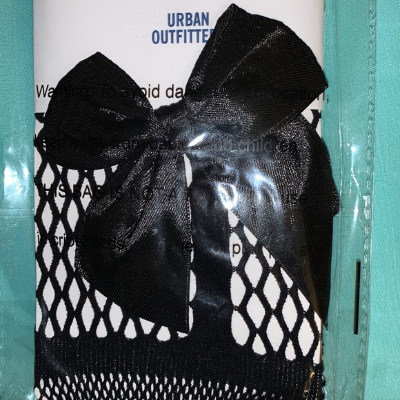 Urban Outfitters Accessories - Black tights with bows in the back - black